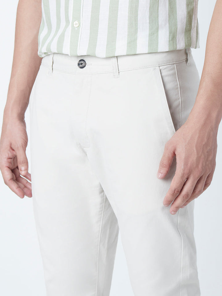 WES Casuals Off-White Cotton-Blend Slim-Fit Mid-Rise Chinos