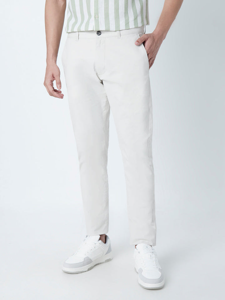 WES Casuals Off-White Cotton-Blend Slim-Fit Mid-Rise Chinos