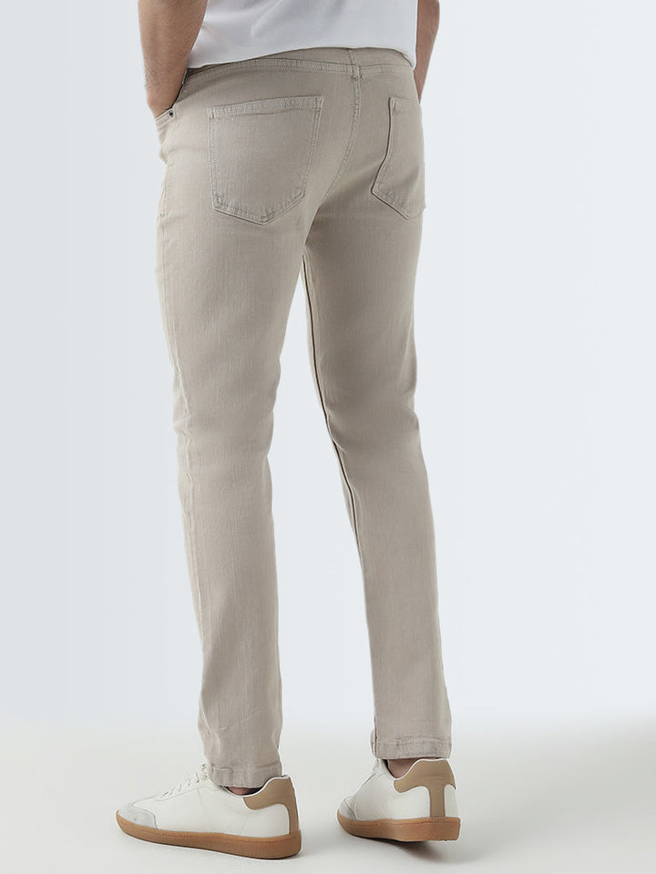 WES Casuals Beige Mid-Rise Slim-Fit Jeans