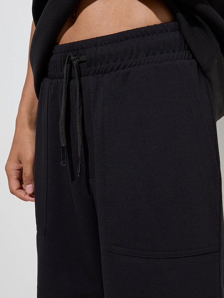 Studiofit Black Solid Relaxed-Fit Mid-Rise Shorts